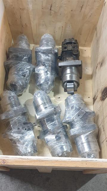 Marine engine components wrapped and packed in a wooden crate for export