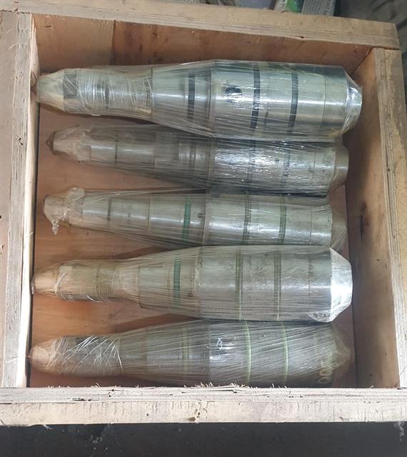 Five Wärtsilä fuel injectors wrapped and packed in a wooden export crate